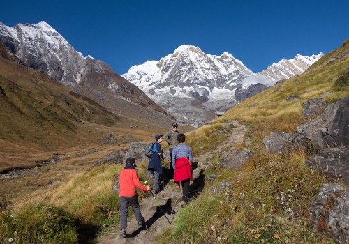 A family trekkers approaching annapurna base camp